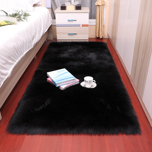 Soft and fluffy black rug, cozy and stylish