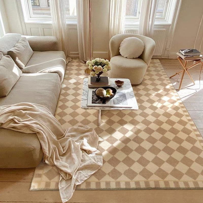 Angled view of off-white and light brown checkerboard rug for living room