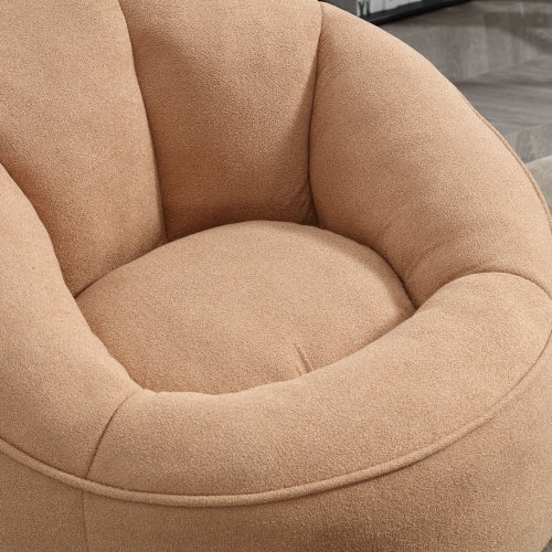Close-up of tan bean bag sofa chair and footrest, showing soft material and stitching details