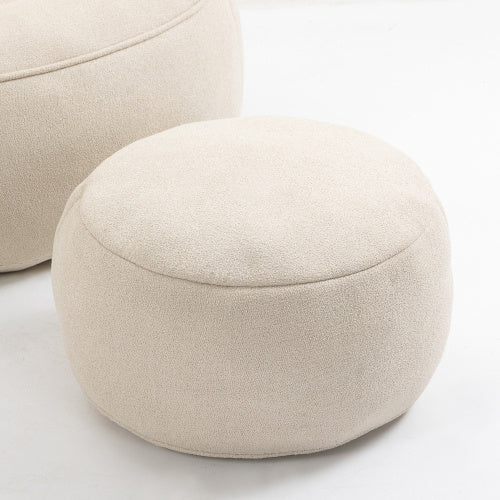 Close-up of beige bean bag sofa chair and footrest, showing soft material and footrest details