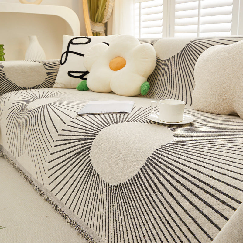 Black radial striped sofa slipcover, pet friendly