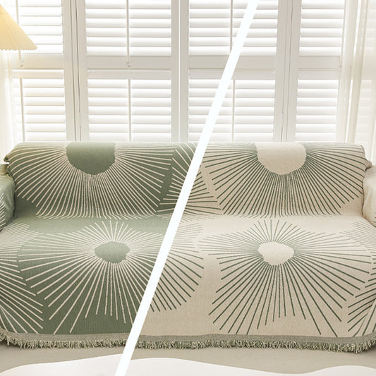 Front and back view of green radial striped sofa slipcover, pet friendly