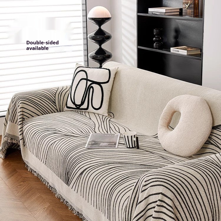 Grey sofa slipcover with semi-circle radiant pattern, pet friendly